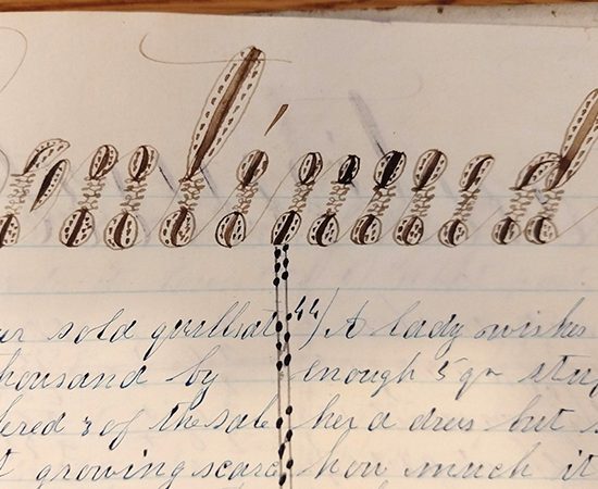 Detail of ornate handwritten word "Continued" from 1859 math workbook of William D. Linebaugh