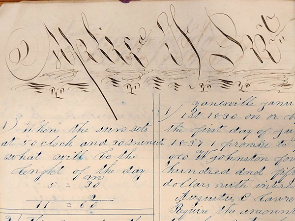 Detail of ornate handwritten word "Splice Of Int. (Interest?)" from 1859 math workbook of William D. Linebaugh