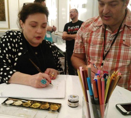 Xandra Y. Zamora giving calligraphy demo, TypeCon 2017, Boston