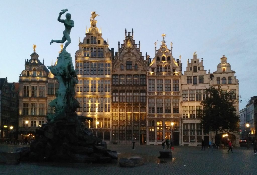 Market plaza, Antwerp with seven tall buildings at dusk