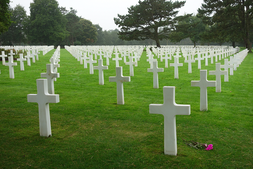 American Cemetery in Normandy, France with white crosses extending to the horizon