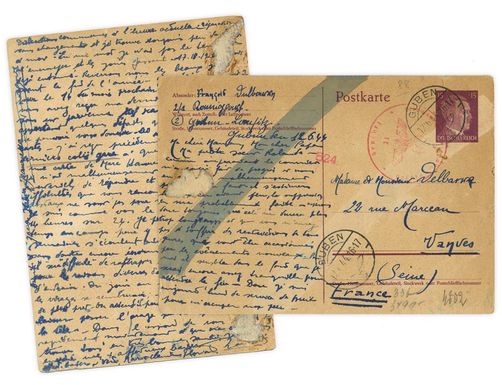Front and back side of handwritten postcard from WWII covered with chemical censor marks